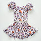 Halloween-themed children's outfit with top and skirt on a white background