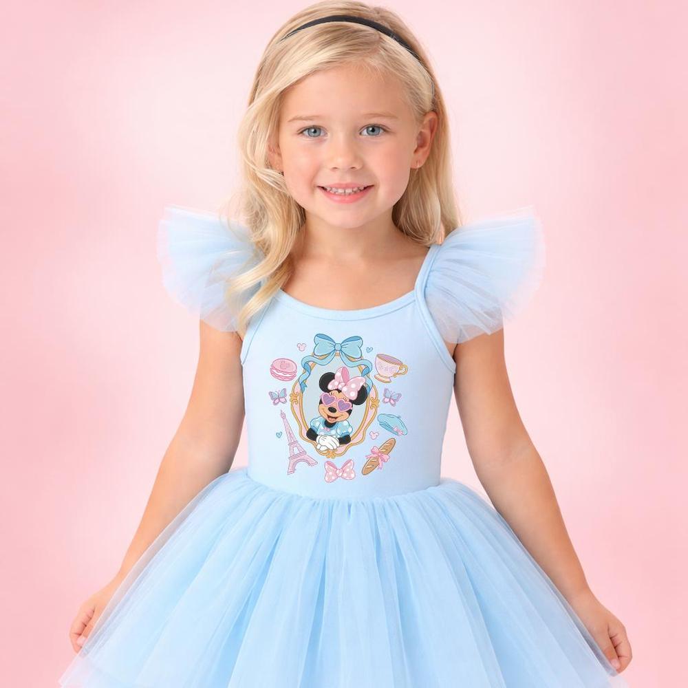 Blonde girl in a light blue The Mouse ballerina dress with tulle sleeves and skirt.