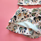 Kids' pink safari activewear set with The, The, Ducky, and Doggy characters.