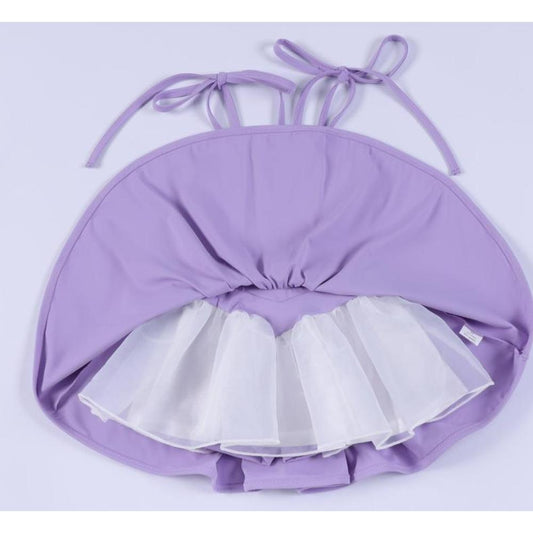 Fairest Twirl lilac athleticwear dress with built-in white biker shorties and a flared skirt.