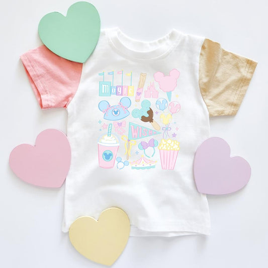 White colorblock tee with pastel The Park-inspired graphics, pink and tan sleeves, surrounded by heart cutouts.