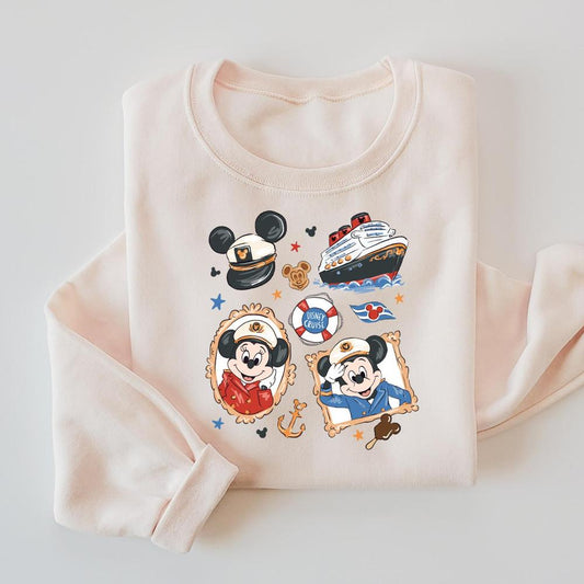 Pale pink crewneck sweater with "Cruisin' With the Mouse" The Park Cruise Line graphics.