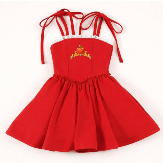 Red activewear dress with white lace trim, tie shoulders, and an apple with a crown embroidery.
