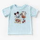 Light blue kids' t-shirt with a "Girly Pirate Mouse" design featuring The ears, a pirate ship, and cherries.