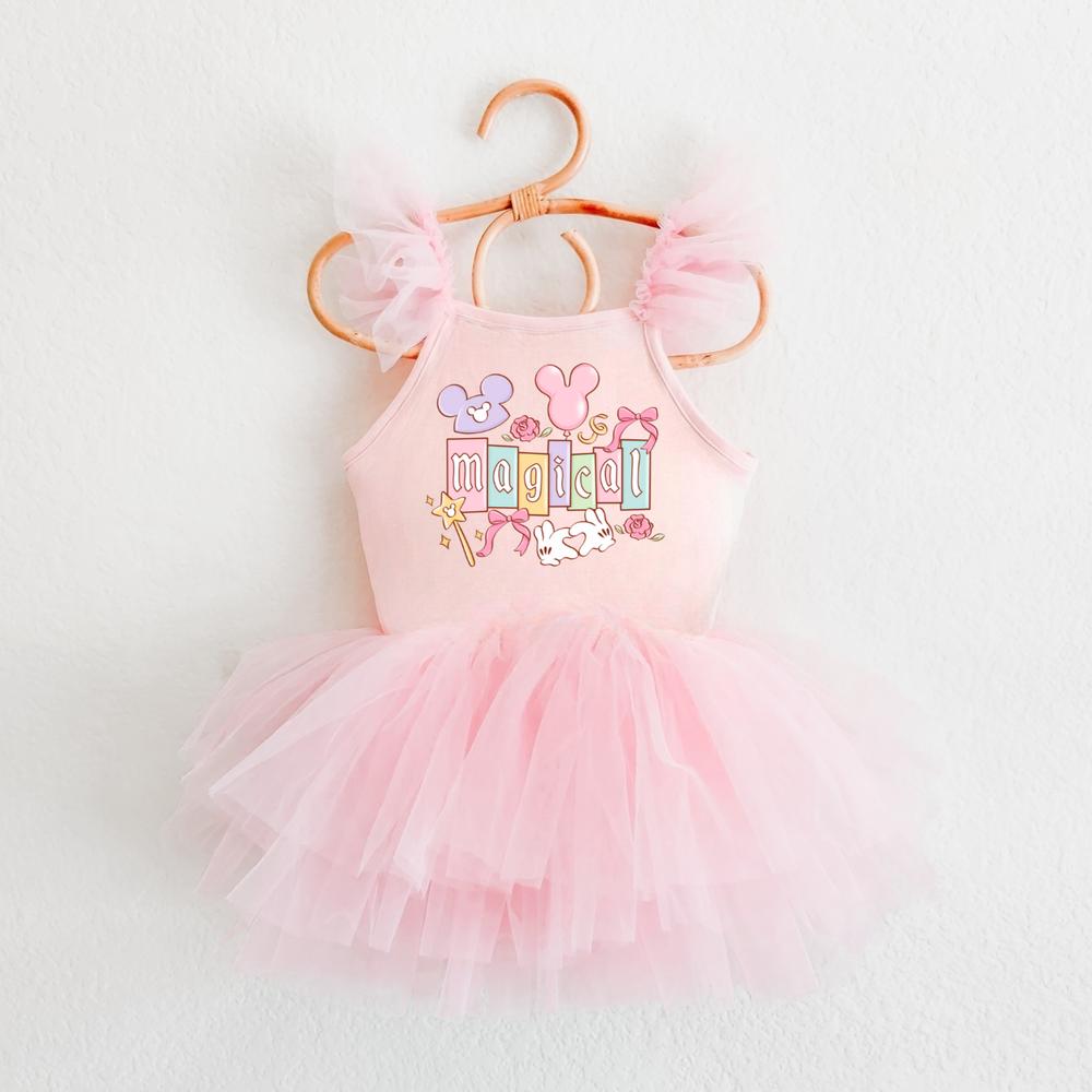 Pink ballerina dress with "Magical" graphic, The ears, wand, and bunnies, featuring ruffled tulle sleeves and skirt.