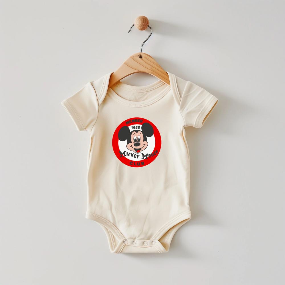 Cream toddler bodysuit with a red and white The Mouse Club logo.