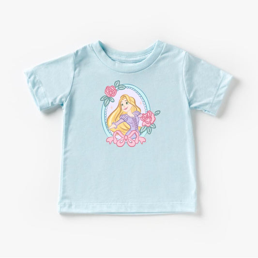 Light blue kids' t-shirt with a colorful Rapunzel graphic, pink roses, and a bow.