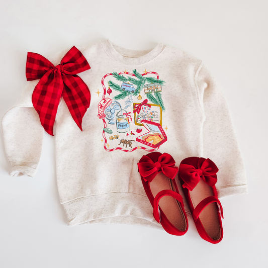 White sweatshirt with Christmas design and red shoes on a white background