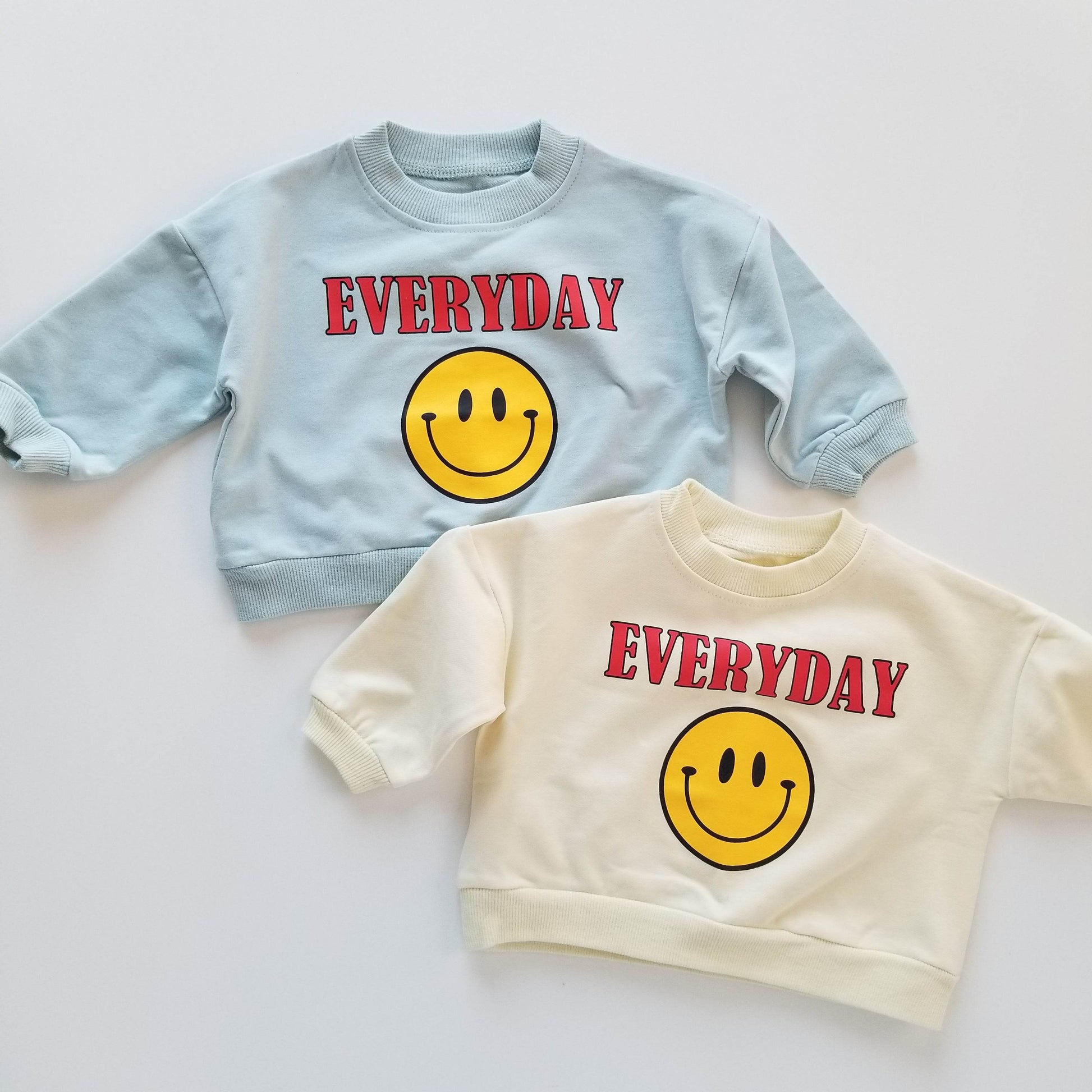 Everyday Smiles Unisex Sweater Collection featheredbreaths