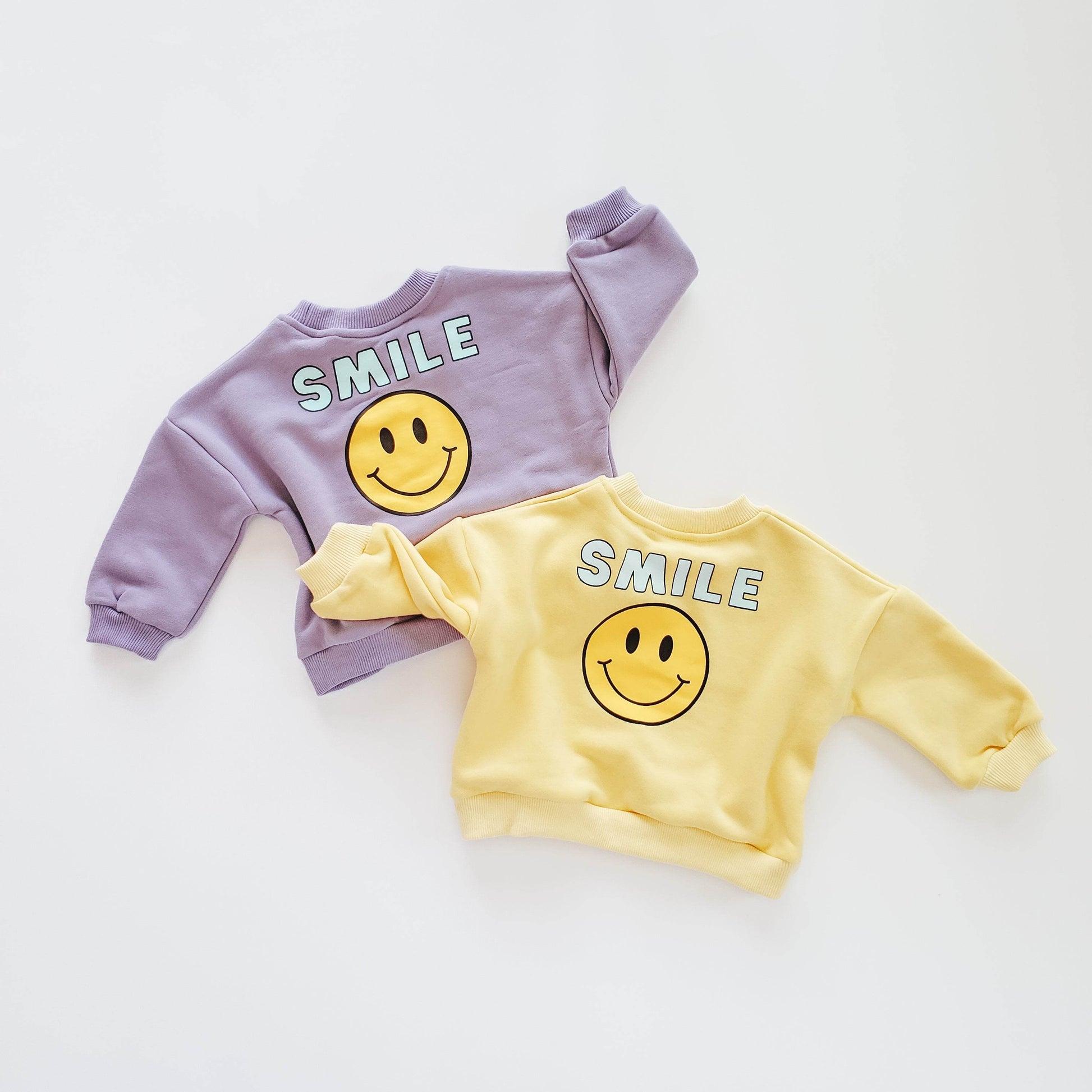 Snuggly Smiley Sweaters for Cozy Comfort and Style featheredbreaths