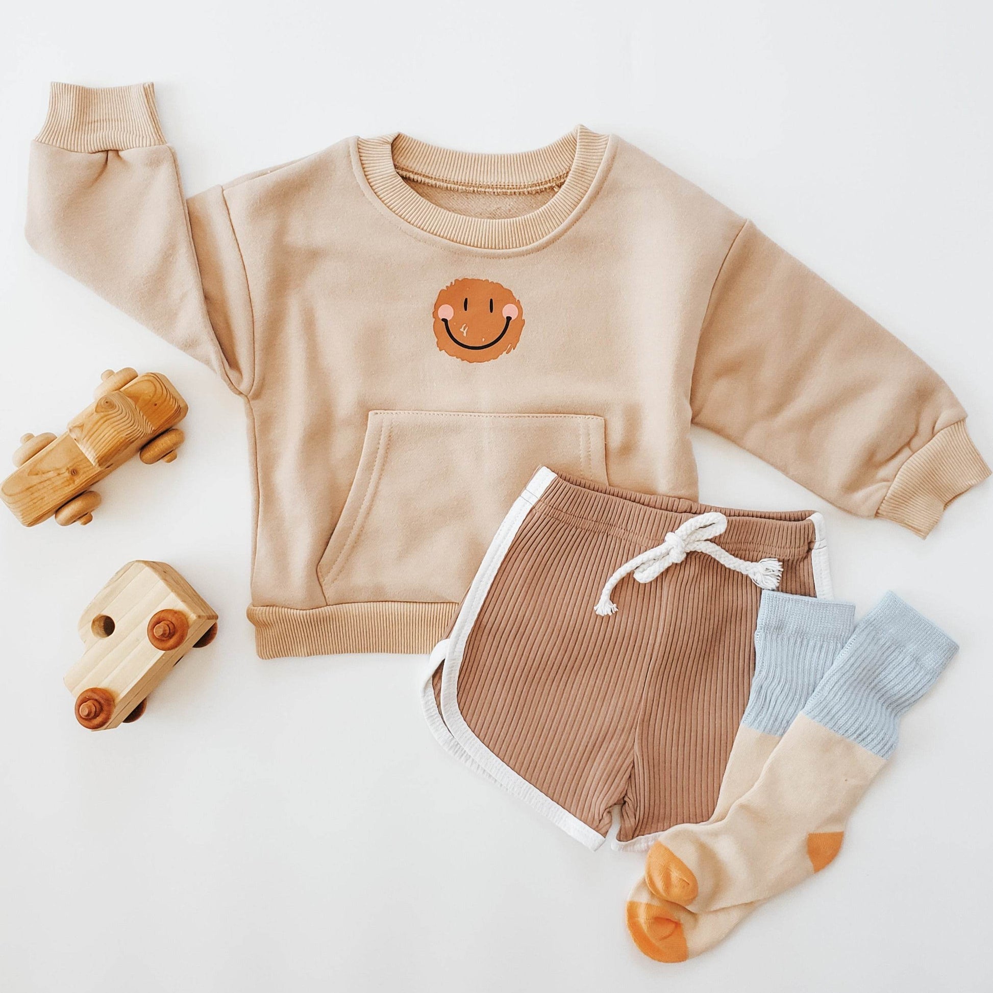 Cozy Baby Smiley Sweater for Infants - Soft & Cute Knitwear featheredbreaths