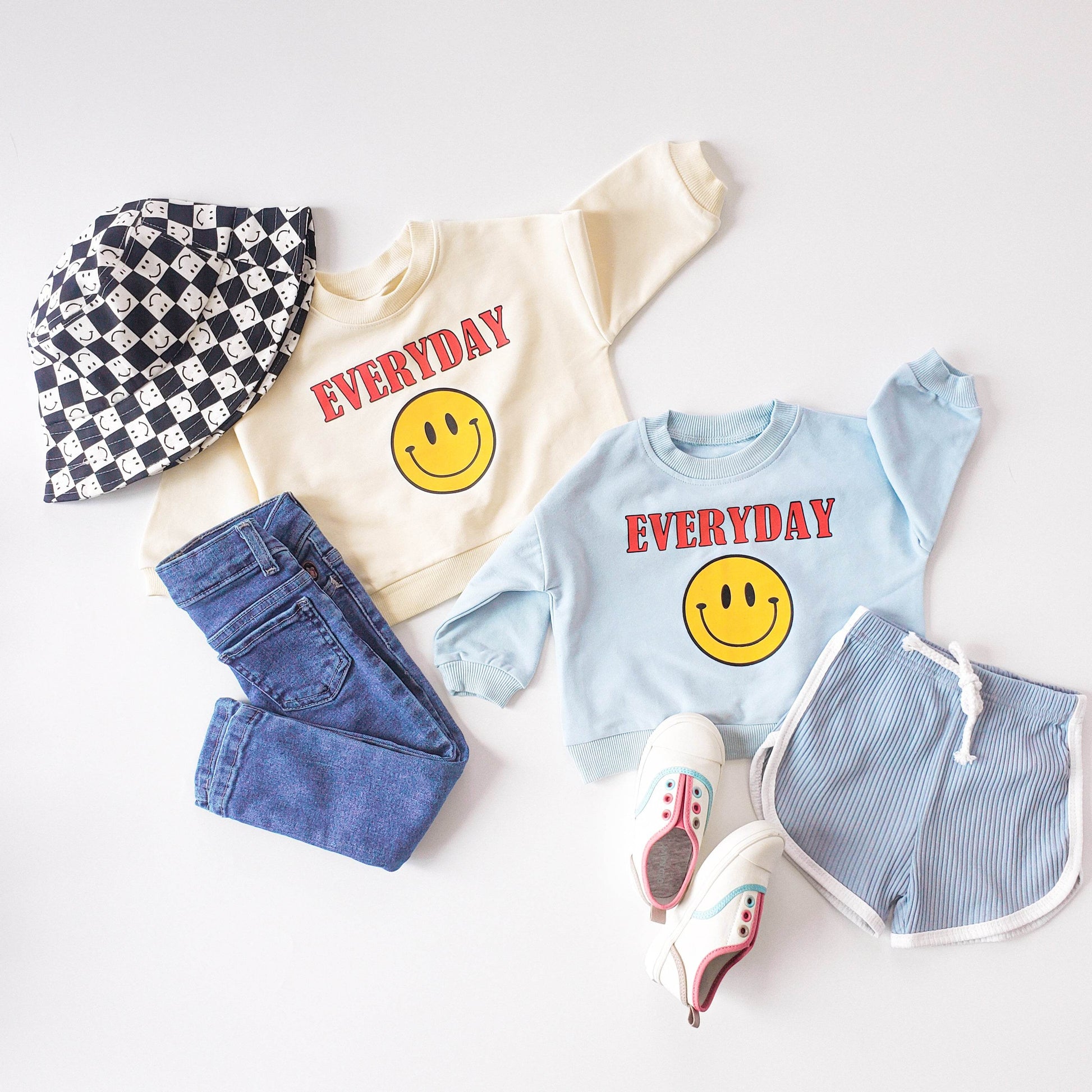 Everyday Smiles Unisex Sweater Collection featheredbreaths
