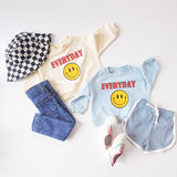 EVERYDAY SMILES GENDER NEUTRAL SWEATER COLLECTION