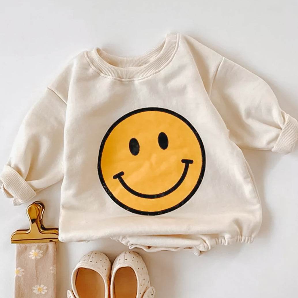 Smiley Snuggly Romper for Babies – Cozy and Cute Infant Outfit featheredbreaths