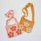 Smiley Flower Power Knit Handbags for Stylish Summer Fashion featheredbreaths