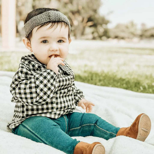 Whimsical toddler tops by featheredbreaths, featuring a checkered design and styled with denim jeans